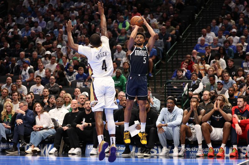 DALLAS, TEXAS - NOVEMBER 19: Quentin Grimes #5 of the Dallas Mavericks shoots as Javonte Green #4 of the New Orleans Pelicans defends during the first half of an Emirates NBA Cup game at American Airlines Center on November 19, 2024 in Dallas, Texas. NOTE TO USER: User expressly acknowledges and agrees that, by downloading and/or using this photograph, user is consenting to the terms and conditions of the Getty Images License Agreement. (Photo by Sam Hodde/Getty Images)