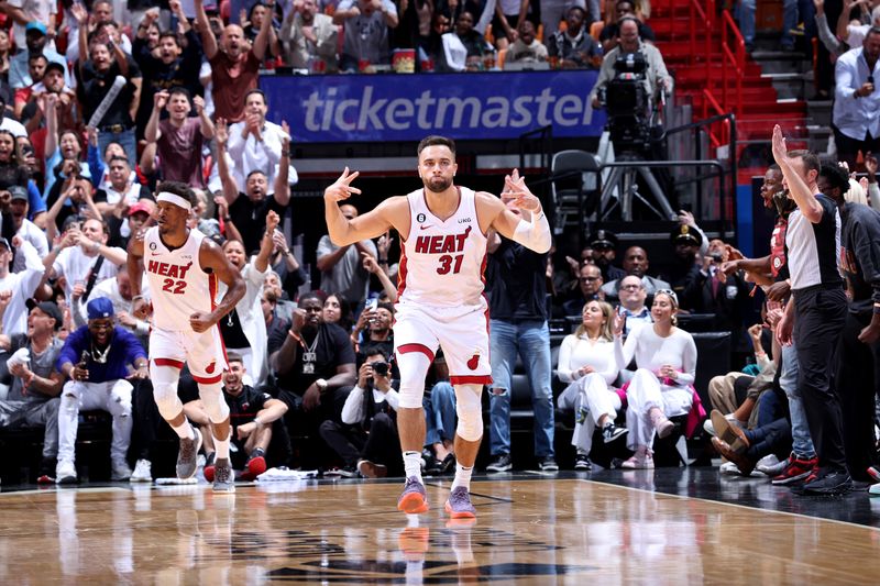 MIAMI, FL - APRIL 14: Max Strus #31 of the Miami Heat celebrates during the game against the Chicago Bulls During the 2023 Play-in Tournament on April 14, 2023 at Kaseya Center in Miami, Florida. NOTE TO USER: User expressly acknowledges and agrees that, by downloading and or using this photograph, User is consenting to the terms and conditions of the Getty Images License Agreement. Mandatory Copyright Notice: Copyright 2023 NBAE (Photo by Jeff Haynes/NBAE via Getty Images)