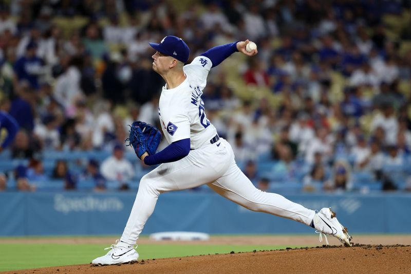 Sep 11, 2024; Los Angeles, California, USA;  Los Angeles Dodgers starting pitcher Bobby Miller (28) pitches during the first inning against the Chicago Cubs at Dodger Stadium. Mandatory Credit: Kiyoshi Mio-Imagn Images