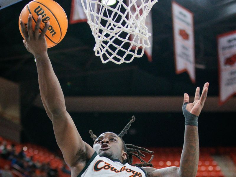 Feb 17, 2024; Stillwater, Oklahoma, USA; Oklahoma State Cowboys guard Jamyron Keller (14) shoots the ball during the first half against the Brigham Young Cougars at Gallagher-Iba Arena. Mandatory Credit: William Purnell-USA TODAY Sports