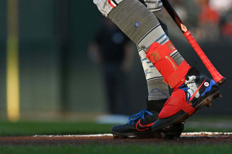 Apr 15, 2024; Baltimore, Maryland, USA; A detailed views of Minnesota Twins outfielder Byron Buxton tribute  Jackie Robinson cleats  during the first inning  at-bat  against the Baltimore Orioles  at Oriole Park at Camden Yards. Mandatory Credit: Tommy Gilligan-USA TODAY Sports