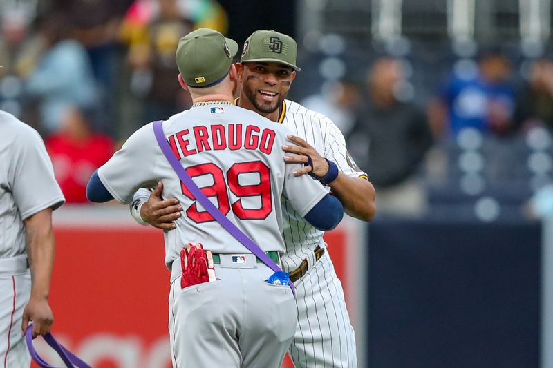 May 20, 2023; San Diego, California, USA; San Diego Padres shortstop Xander Bogaerts (2) hugs former teammate Boston Red Sox right fielder Alex Verdugo (99) before the game against the Boston Red Sox at Petco Park. Mandatory Credit: David Frerker-USA TODAY Sports