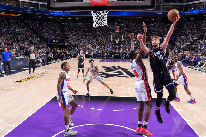 SACRAMENTO, CA - FEBRUARY 7: Domantas Sabonis #10 of the Sacramento Kings drives to the basket during the game against the Detroit Pistons on February 7, 2024 at Golden 1 Center in Sacramento, California. NOTE TO USER: User expressly acknowledges and agrees that, by downloading and or using this Photograph, user is consenting to the terms and conditions of the Getty Images License Agreement. Mandatory Copyright Notice: Copyright 2024 NBAE (Photo by Rocky Widner/NBAE via Getty Images)