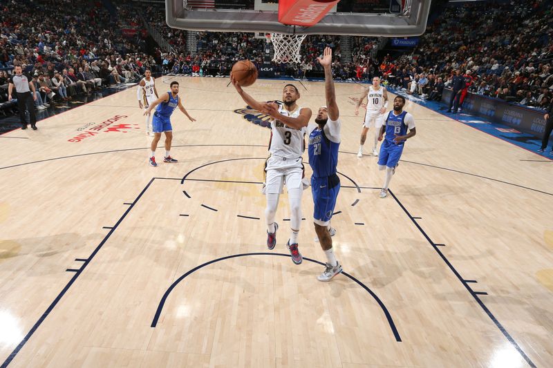 NEW ORLEANS, LA - JANUARY 15:  CJ McCollum #3 of the New Orleans Pelicans drives to the basket during the game against the Dallas Mavericks on January 15, 2025 at the Smoothie King Center in New Orleans, Louisiana. NOTE TO USER: User expressly acknowledges and agrees that, by downloading and or using this Photograph, user is consenting to the terms and conditions of the Getty Images License Agreement. Mandatory Copyright Notice: Copyright 2025 NBAE (Photo by Layne Murdoch Jr./NBAE via Getty Images)