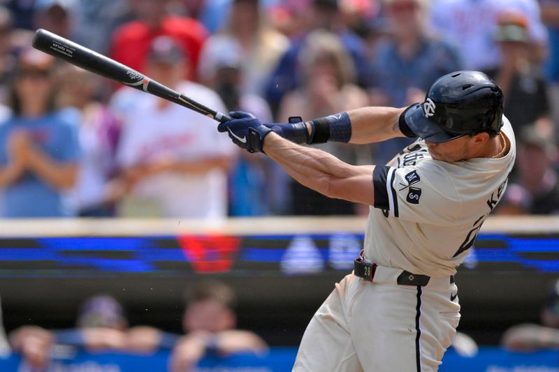 Jul 24, 2024; Minneapolis, Minnesota, USA;  Minnesota Twins outfielder Max Kepler (26) breaks his bat on a game-winning RBI single against the Philadelphia Phillies during the ninth inning at Target Field. Mandatory Credit: Nick Wosika-USA TODAY Sports