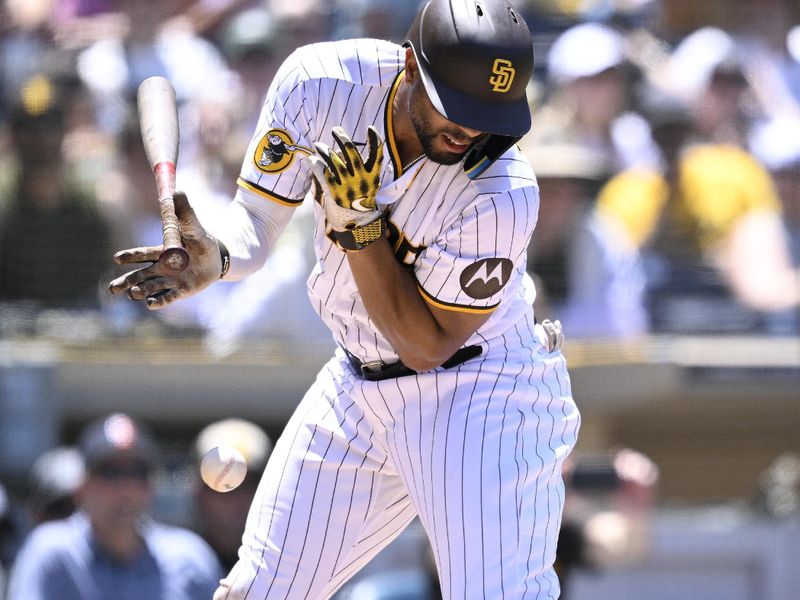 Jul 26, 2023; San Diego, California, USA; San Diego Padres shortstop Xander Bogaerts (2) is hit by a pitch during the third inning against the Pittsburgh Pirates at Petco Park. Mandatory Credit: Orlando Ramirez-USA TODAY Sports