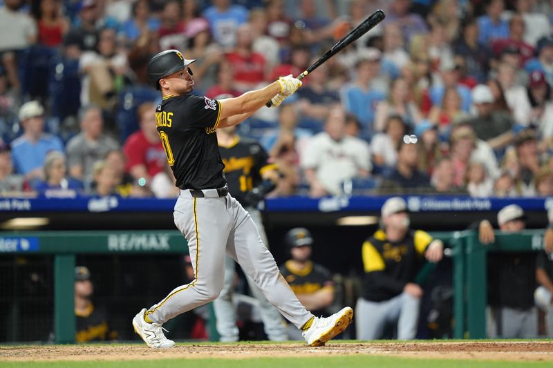 May 17, 2025; Philadelphia, Pennsylvania, USA; Pittsburgh Pirates outfielder Bryan Reynolds (10) hits a two-run home run against the Philadelphia Phillies in the ninth inning at Citizens Bank Park. Mandatory Credit: Kyle Ross-Imagn Images