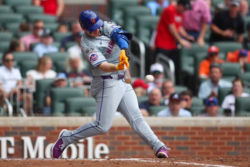 Sep 30, 2024; Atlanta, Georgia, USA; New York Mets first baseman Pete Alonso (20) hits a single against the Atlanta Braves in the fifth inning at Truist Park. Mandatory Credit: Brett Davis-Imagn Images