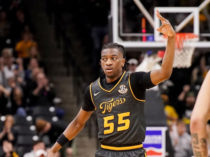 Feb 20, 2024; Columbia, Missouri, USA; Missouri Tigers guard Sean East II (55) celebrates against the Tennessee Volunteers after making a three point shot during the first half at Mizzou Arena. Mandatory Credit: Denny Medley-USA TODAY Sports