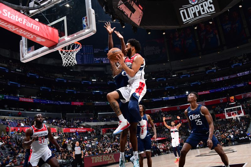 LOS ANGELES, CA - MARCH 1: Anthony Gill #16 of the Washington Wizards drives to the basket during the game against the LA Clippers on March 1, 2024 at Crypto.Com Arena in Los Angeles, California. NOTE TO USER: User expressly acknowledges and agrees that, by downloading and/or using this Photograph, user is consenting to the terms and conditions of the Getty Images License Agreement. Mandatory Copyright Notice: Copyright 2024 NBAE (Photo by Adam Pantozzi/NBAE via Getty Images)