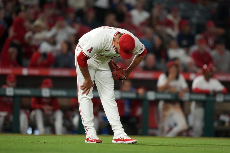 Apr 30, 2024; Anaheim, California, USA; Los Angeles Angels pitcher Carlos Estevez (53) reacts after surrendering a home run in the ninth inning against the Philadelphia Phillies at Angel Stadium. Mandatory Credit: Kirby Lee-USA TODAY Sports