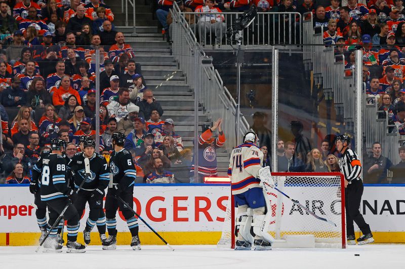 Oct 28, 2025; Edmonton, Alberta, CAN; The Utah Mammoth celebrate a goal scored by forward JJ Peterka (77) during the first period against the Edmonton Oilers at Rogers Place. Mandatory Credit: Perry Nelson-Imagn Images