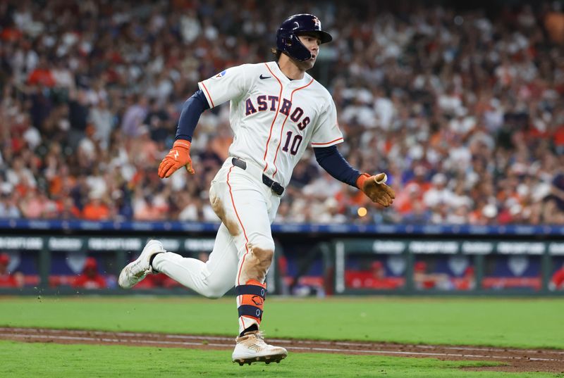 Mar 26, 2026; Houston, Texas, USA; Houston Astros left fielder Joey Loperfido (10) hits a double against the Los Angeles Angels in the sixth inning at Daikin Park. Mandatory Credit: Thomas Shea-Imagn Images