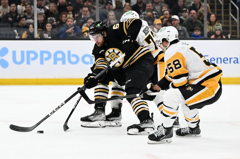 Mar 9, 2024; Boston, Massachusetts, USA; Boston Bruins right wing Justin Brazeau (55) skates against Pittsburgh Penguins defenseman Pierre-Olivier Joseph (73) and defenseman Kris Letang (58) during the first period at the TD Garden. Mandatory Credit: Brian Fluharty-USA TODAY Sports