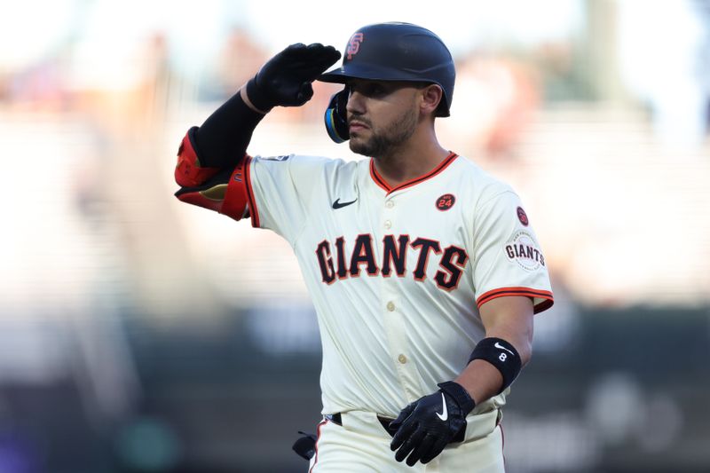 Aug 19, 2024; San Francisco, California, USA; San Francisco Giants outfielder Michael Conforto (8) celebrates after hitting a single during the second inning against the Chicago White Sox at Oracle Park. Mandatory Credit: Sergio Estrada-USA TODAY Sports