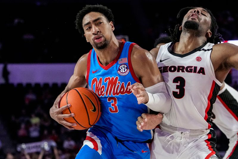 Feb 7, 2023; Athens, Georgia, USA; Mississippi Rebels forward Myles Burns (3) is called for a charging foul against Georgia Bulldogs guard Kario Oquendo (3) during the first half at Stegeman Coliseum. Mandatory Credit: Dale Zanine-USA TODAY Sports