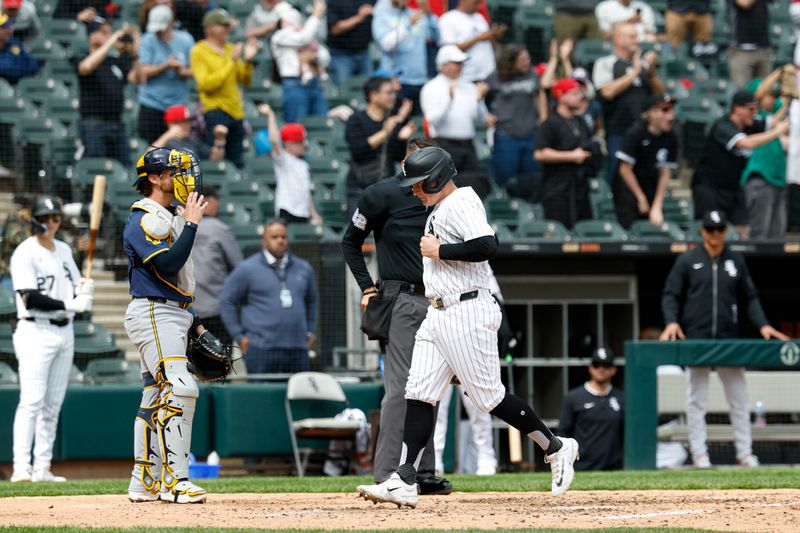 May 1, 2025; Chicago, Illinois, USA; Chicago White Sox first baseman Andrew Vaughn (25) scores against the Milwaukee Brewers during the sixth inning at Rate Field. Mandatory Credit: Kamil Krzaczynski-Imagn Images