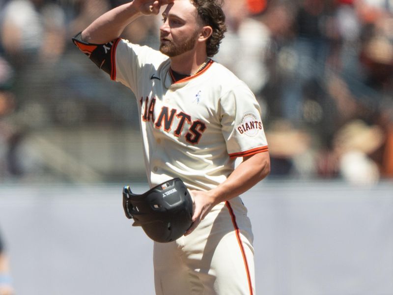 Jun 16, 2024; San Francisco, California, USA;  San Francisco Giants shortstop Brett Wisely (0) salutes the dugout after hitting a double during the third inning against the Los Angeles Angels at Oracle Park. Mandatory Credit: Stan Szeto-USA TODAY Sports