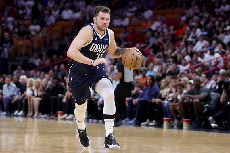 MIAMI, FLORIDA - APRIL 01: Luka Doncic #77 of the Dallas Mavericks in action against the Miami Heat during the second quarter at Miami-Dade Arena on April 01, 2023 in Miami, Florida. NOTE TO USER: User expressly acknowledges and agrees that, by downloading and or using this photograph, User is consenting to the terms and conditions of the Getty Images License Agreement. (Photo by Megan Briggs/Getty Images)