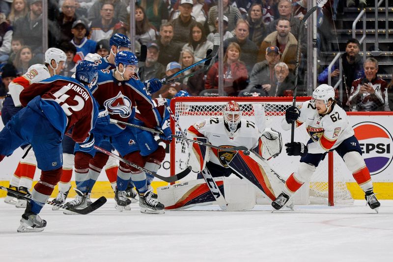 Jan 6, 2024; Denver, Colorado, USA; Colorado Avalanche center Ross Colton (20) attempts to deflect a shot from defenseman Josh Manson (42) as Florida Panthers goaltender Sergei Bobrovsky (72) and defenseman Brandon Montour (62) defend in the first period at Ball Arena. Mandatory Credit: Isaiah J. Downing-USA TODAY Sports