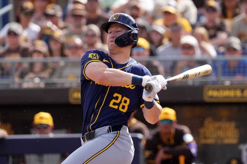 Feb 24, 2024; Peoria, Arizona, USA; Milwaukee Brewers center fielder Joey Wiemer (28) bats during the first inning of a Spring Training game at Peoria Sports Complex. Mandatory Credit: Joe Camporeale-USA TODAY Sports