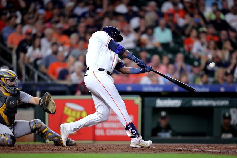 Sep 13, 2023; Houston, Texas, USA; Houston Astros left fielder Yordan Alvarez (44) hits a three-run home run to right field against the Oakland Athletics during the third inning at Minute Maid Park. Mandatory Credit: Erik Williams-USA TODAY Sports