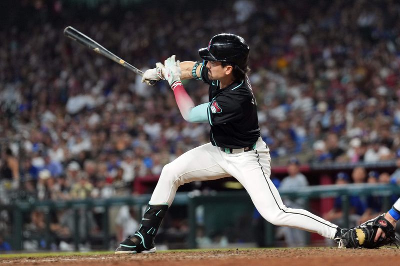 Sep 2, 2024; Phoenix, Arizona, USA; Arizona Diamondbacks outfielder Corbin Carroll (7) bats against the Los Angeles Dodgers during the seventh inning at Chase Field. Mandatory Credit: Joe Camporeale-USA TODAY Sports