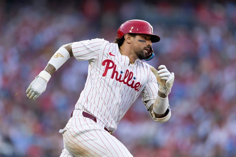 Jun 18, 2024; Philadelphia, Pennsylvania, USA; Philadelphia Phillies outfielder Nick Castellanos (8) runs the bases after hitting a double during the fourth inning against the San Diego Padres at Citizens Bank Park. Mandatory Credit: Bill Streicher-USA TODAY Sports