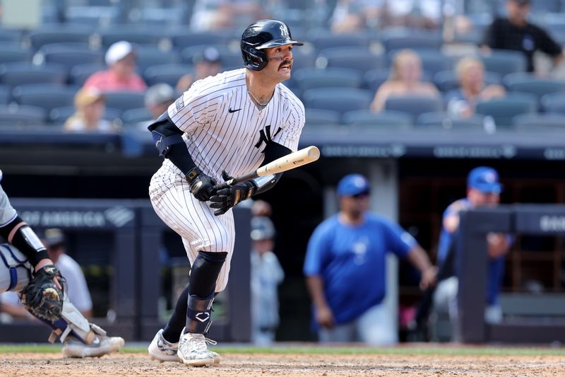 Aug 3, 2024; Bronx, New York, USA; New York Yankees catcher Austin Wells (28) follows through on an RBI single against the Toronto Blue Jays during the eighth inning at Yankee Stadium. Mandatory Credit: Brad Penner-USA TODAY Sports