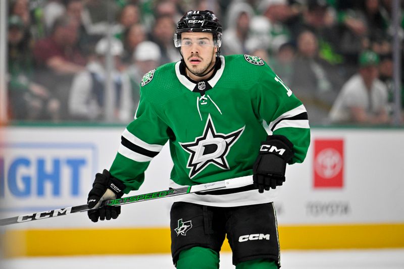 Feb 26, 2024; Dallas, Texas, USA;Dallas Stars center Logan Stankoven (11) skates against the New York Islanders  during the first period at the American Airlines Center. Mandatory Credit: Jerome Miron-USA TODAY Sports