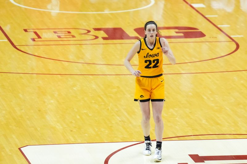 Feb 22, 2024; Bloomington, Indiana, USA;  Iowa Hawkeyes guard Caitlin Clark (22) reacts on the court during the game against the Indiana Hoosiers in the second half at Simon Skjodt Assembly Hall. Mandatory Credit: Aaron Doster-USA TODAY Sports