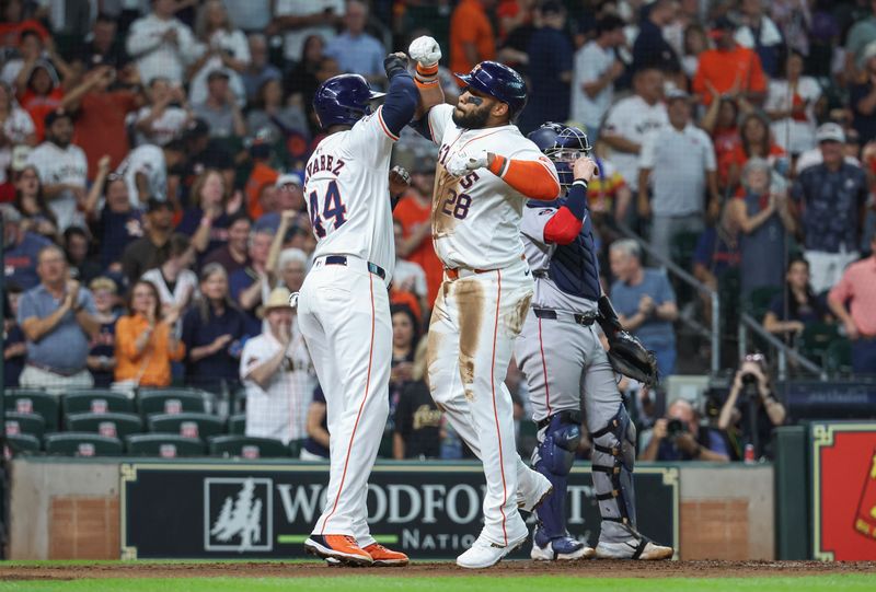 Aug 20, 2024; Houston, Texas, USA; Houston Astros first baseman Jon Singleton (28) celebrates with designated hitter Yordan Alvarez (44) after hitting a home run during the first inning against the Boston Red Sox at Minute Maid Park. Mandatory Credit: Troy Taormina-USA TODAY Sports