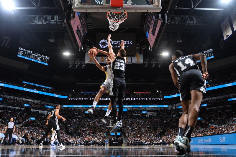 SAN ANTONIO, TX - MARCH 11:  Trayce Jackson-Davis #32 of the Golden State Warriors  drives to the basket during the game against the San Antonio Spurs on March 11, 2024 at the Frost Bank Center in San Antonio, Texas. NOTE TO USER: User expressly acknowledges and agrees that, by downloading and or using this photograph, user is consenting to the terms and conditions of the Getty Images License Agreement. Mandatory Copyright Notice: Copyright 2024 NBAE (Photos by Michael Gonzales/NBAE via Getty Images)