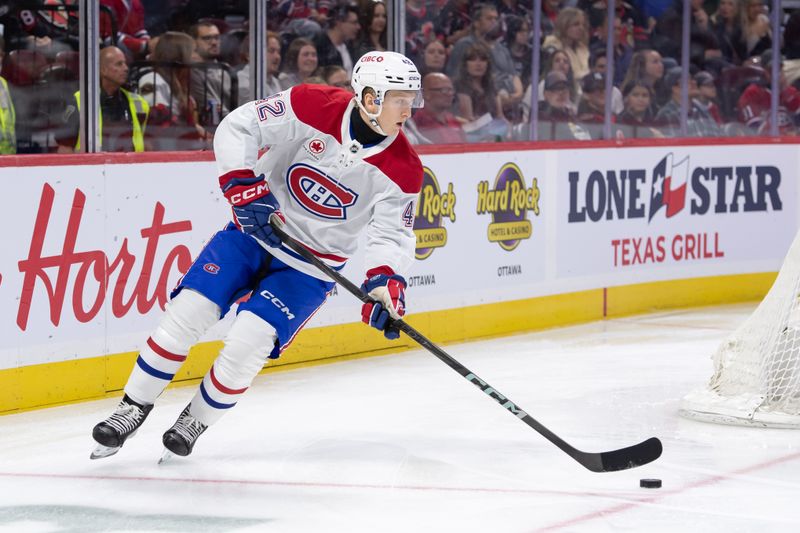 Oct 5, 2024; Ottawa, Ontario, CAN; Montreal Canadiens defenseman Adam Engstrom (42) skates with the puck in the first period against the Ottawa Senators at the Canadian Tire Centre. Mandatory Credit: Marc DesRosiers-Imagn Images