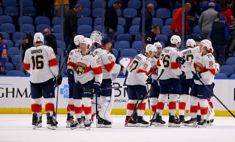 Oct 28, 2024; Buffalo, New York, USA;  The Florida Panthers celebrate a win over the Buffalo Sabres at KeyBank Center. Mandatory Credit: Timothy T. Ludwig-Imagn Images