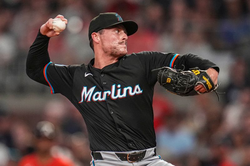 Aug 2, 2024; Cumberland, Georgia, USA; Miami Marlins relief pitcher Calvin Faucher (53) pitches against the Atlanta Braves during the eighth inning at Truist Park. Mandatory Credit: Dale Zanine-USA TODAY Sports