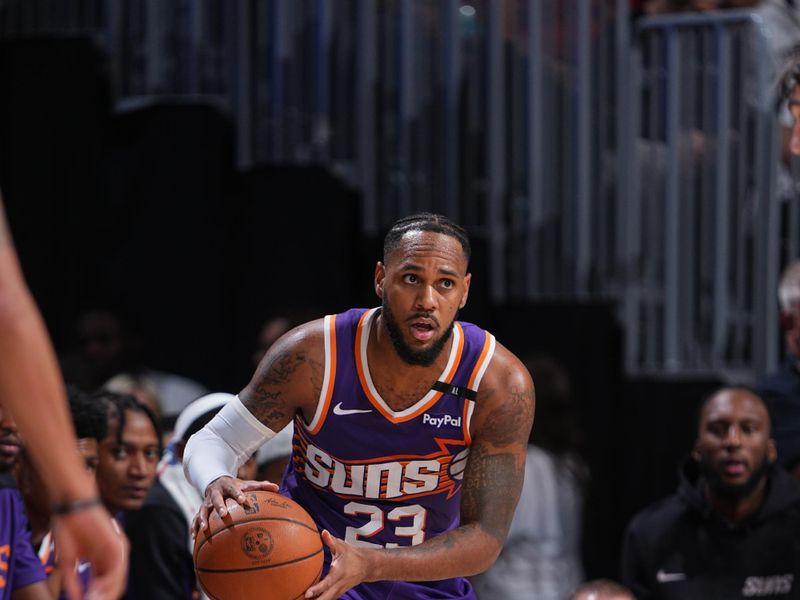 DENVER, CO - OCTOBER 13: Monte Morris #23 of the Phoenix Suns handles the ball during the game against the Denver Nuggets on October 13, 2024 at Ball Arena in Denver, Colorado. NOTE TO USER: User expressly acknowledges and agrees that, by downloading and/or using this Photograph, user is consenting to the terms and conditions of the Getty Images License Agreement. Mandatory Copyright Notice: Copyright 2024 NBAE (Photo by Garrett Ellwood/NBAE via Getty Images)