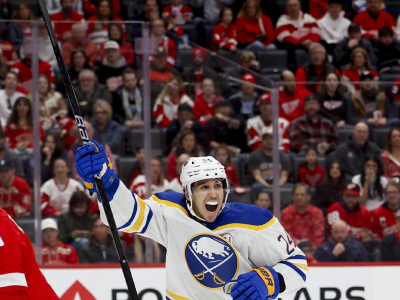 Mar 16, 2024; Detroit, Michigan, USA;  Buffalo Sabres center Dylan Cozens (24) celebrates a foul by Buffalo Sabres right wing Tage Thompson (not pictured) in the first period against the Detroit Red Wings at Little Caesars Arena. Mandatory Credit: Rick Osentoski-USA TODAY Sports