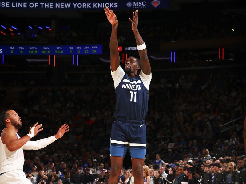 NEW YORK, NY - OCTOBER 13: Naz Reid #11 of the Minnesota Timberwolves shoots a three point basket during the game on October 13, 2024 at Madison Square Garden in New York City, New York.  NOTE TO USER: User expressly acknowledges and agrees that, by downloading and or using this photograph, User is consenting to the terms and conditions of the Getty Images License Agreement. Mandatory Copyright Notice: Copyright 2024 NBAE  (Photo by David L. Nemec/NBAE via Getty Images)