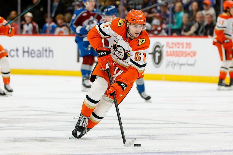 Jan 21, 2026; Denver, Colorado, USA; Anaheim Ducks left wing Cutter Gauthier (61) controls the puck in the third period against the Colorado Avalanche at Ball Arena. Mandatory Credit: Isaiah J. Downing-Imagn Images
