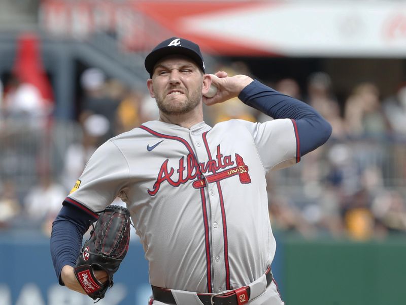 May 26, 2024; Pittsburgh, Pennsylvania, USA;  Atlanta Braves relief pitcher Dylan Lee (52) pitches against the Pittsburgh Pirates during the ninth inning at PNC Park. Atlanta won 8-1. Mandatory Credit: Charles LeClaire-USA TODAY Sports