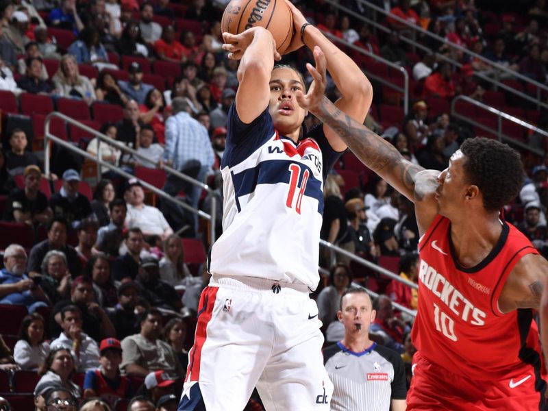 HOUSTON, TX - NOVEMBER 11: Kyshawn George #18 of the Washington Wizards shoots the ball during the game against the Houston Rockets on November 11, 2024 at the Toyota Center in Houston, Texas. NOTE TO USER: User expressly acknowledges and agrees that, by downloading and or using this photograph, User is consenting to the terms and conditions of the Getty Images License Agreement. Mandatory Copyright Notice: Copyright 2024 NBAE (Photo by Logan Riely/NBAE via Getty Images)