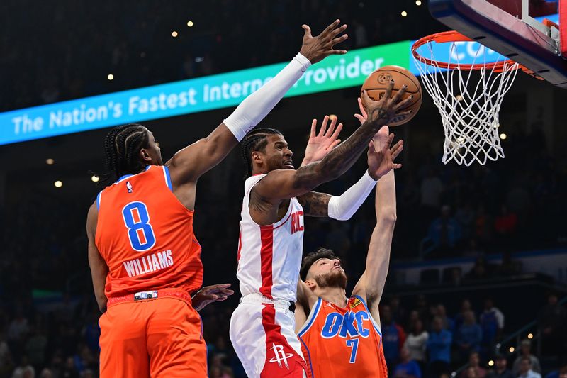 OKLAHOMA CITY, OKLAHOMA - NOVEMBER 8: Jalen Green #4 of the Houston Rockets takes the ball to the basket during the first half against the Oklahoma City Thunder at Paycom Center on November 8, 2024 in Oklahoma City, Oklahoma. NOTE TO USER: User expressly acknowledges and agrees that, by downloading and or using this photograph, User is consenting to the terms and conditions of the Getty Images License Agreement. (Photo by Joshua Gateley/Getty Images)