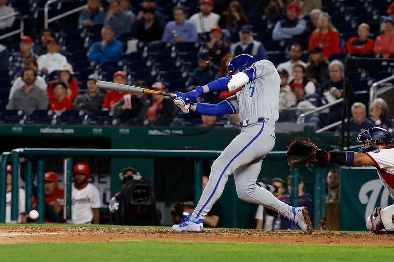 Sep 24, 2024; Washington, District of Columbia, USA; Kansas City Royals shortstop Bobby Witt Jr. (7) singles against the Washington Nationals during the tenth inning at Nationals Park. Mandatory Credit: Geoff Burke-Imagn Images