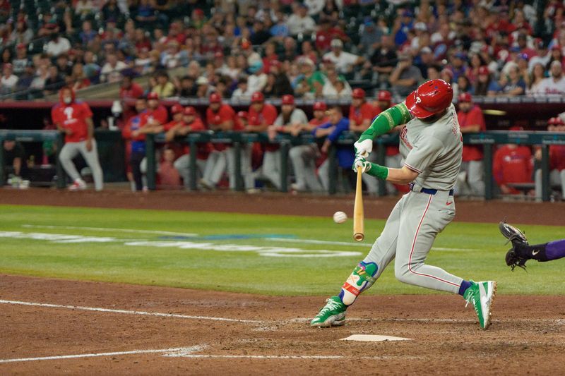 Sep 21, 2025; Phoenix, Arizona, USA; Philadelphia Phillies infielder Bryce Harper (3) singles on a sharp line drive to center in the ninth inning against the Arizona Diamondbacks at Chase Field. Mandatory Credit: Allan Henry-Imagn Images