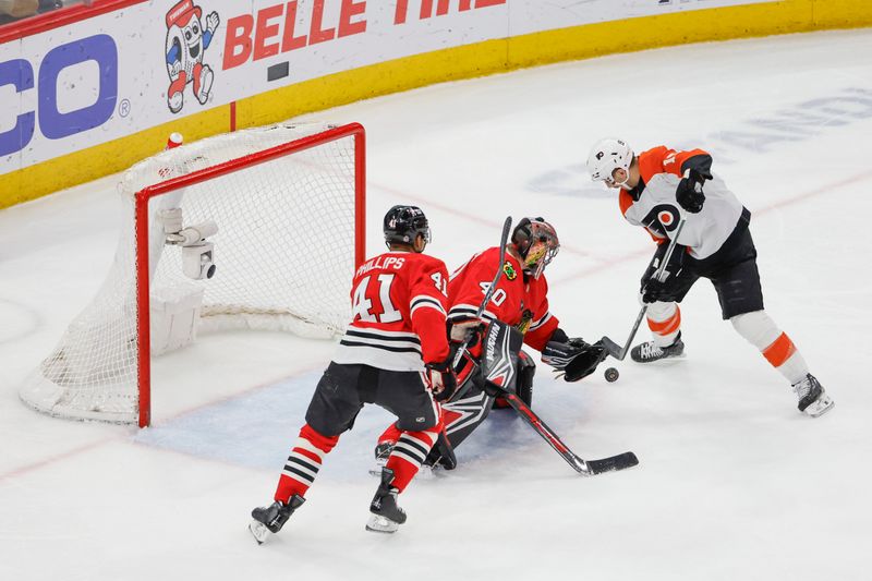 Feb 21, 2024; Chicago, Illinois, USA; Philadelphia Flyers right wing Garnet Hathaway (19) shoots and scores against the Chicago Blackhawks during the second period at United Center. Mandatory Credit: Kamil Krzaczynski-USA TODAY Sports