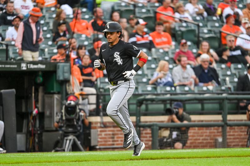 Sep 4, 2024; Baltimore, Maryland, USA; Chicago White Sox second base Nicky Lopez (8) rounds the bases after hitting a first inning home run against the Baltimore Orioles  at Oriole Park at Camden Yards. Mandatory Credit: Tommy Gilligan -Imagn Images
