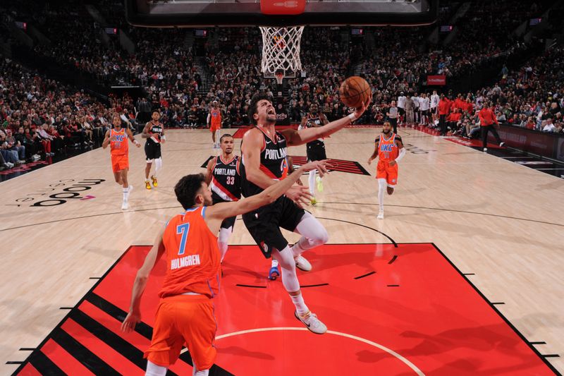 PORTLAND, OR - NOVEMBER 1: Deni Avdija #8 of the Portland Trail Blazers drives to the basket during the game against the Oklahoma City Thunder on November 1, 2024 at the Moda Center Arena in Portland, Oregon. NOTE TO USER: User expressly acknowledges and agrees that, by downloading and or using this photograph, user is consenting to the terms and conditions of the Getty Images License Agreement. Mandatory Copyright Notice: Copyright 2024 NBAE (Photo by Cameron Browne/NBAE via Getty Images)