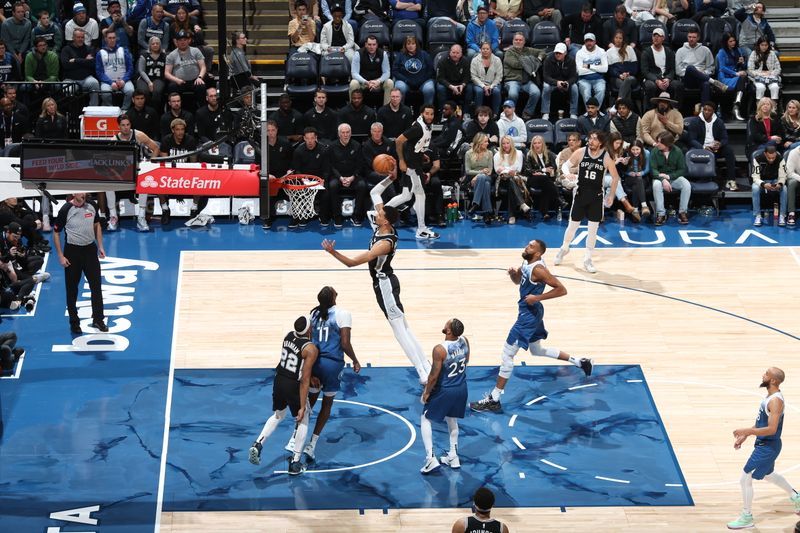 MINNEAPOLIS, MN -  FEBRUARY 27: Victor Wembanyama #1 of the San Antonio Spurs dunks the ball during the game against the Minnesota Timberwolves on February 27, 2024 at Target Center in Minneapolis, Minnesota. NOTE TO USER: User expressly acknowledges and agrees that, by downloading and or using this Photograph, user is consenting to the terms and conditions of the Getty Images License Agreement. Mandatory Copyright Notice: Copyright 2024 NBAE (Photo by David Sherman/NBAE via Getty Images)