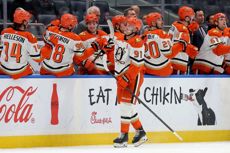 Dec 11, 2025; Elmont, New York, USA; Anaheim Ducks center Leo Carlsson (91) celebrates his goal against the New York Islanders with teammates during the second period at UBS Arena. Mandatory Credit: Brad Penner-Imagn Images